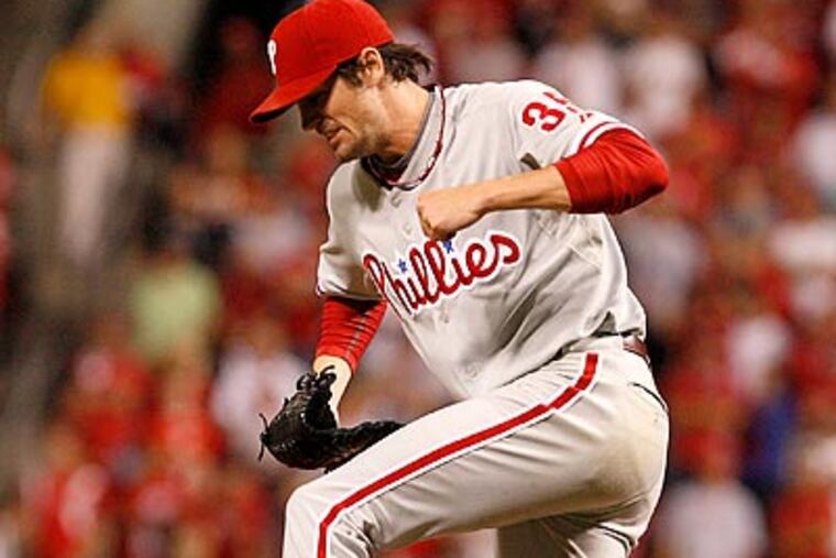 Cole Hamels let loose a celebratory fist pump after finishing his complete game. (Ron Cortes/Staff Photographer)