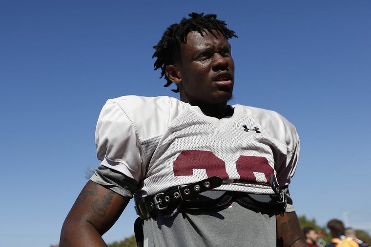 Temple's Jyquis Thomas talks with reporters after Temple football practice in Philadelphia, PA on October 18, 2016. DAVID MAIALETTI / Staff Photographer
