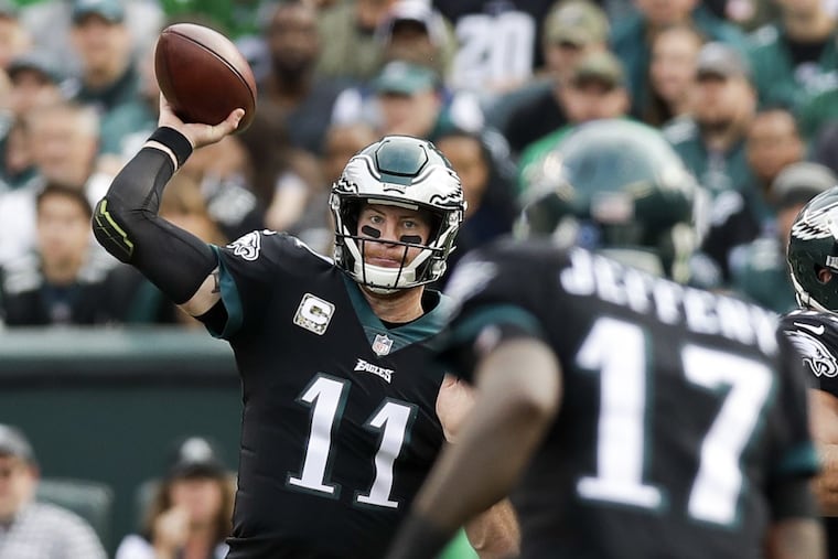 Eagles quarterback Carson Wentz throws the football to wide receiver Alshon Jeffery against the Denver Broncos on Sunday, November 5, 2017 in Philadelphia. YONG KIM / Staff Photographer