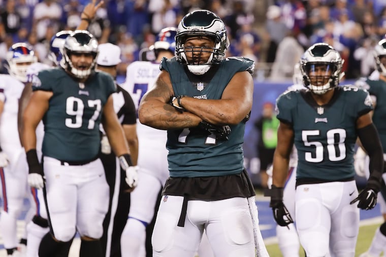 Eagles defensive end Michael Bennett poses after sacking New York Giants quarterback Eli Manning on Thursday, October 11, 2018 in East Rutherford, NJ.