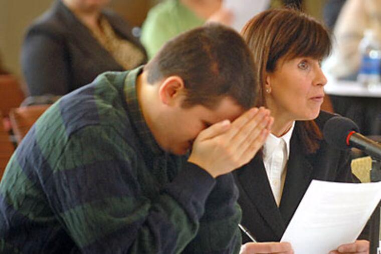 Testifying for mental-health funding, Donna Icovino came with son Michael, a group-home resident. Tom Gralish/Staff Photographer)