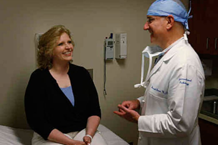 Nasha Smith visits Joseph Bonn, the doctor who treated her. "The procedure was so simple, yet life-changing," she said. (Michael S. Wirtz / Staff)