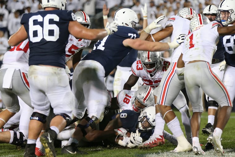 Penn State running back Miles Sanders (8) scores a touchdown against Ohio State on Sept. 29, 2018. Penn State lost ,27-26.