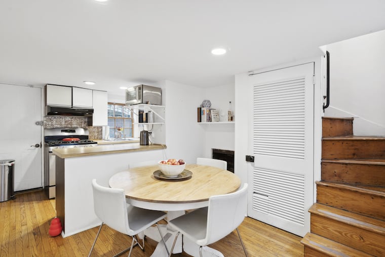 The kitchen and dining area. The rowhouse has 900 square feet of space.
