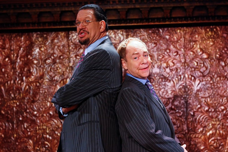 Penn Jillette, left, and Teller, right, appear at the "Penn & Teller On Broadway" preview performance at 54 Below on Friday, June 26, 2015, in New York. (Photo by Andy Kropa/Invision/AP)