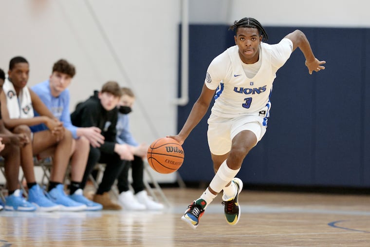 Phelps' Chas Kelley bringing the ball up court during a Feb. 12 game.