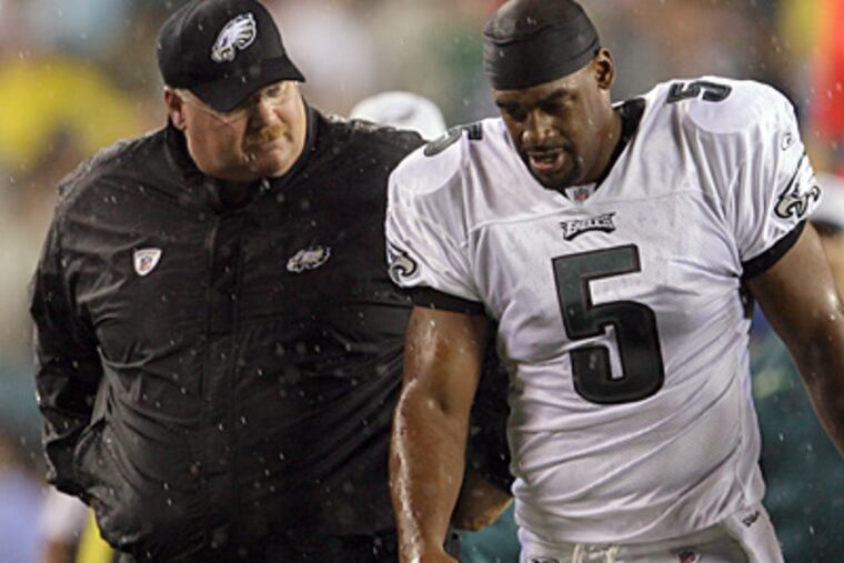 Eagles head coach Andy Reid and quarterback Donovan McNabb could soon part ways. (Yong Kim / Staff Photographer)