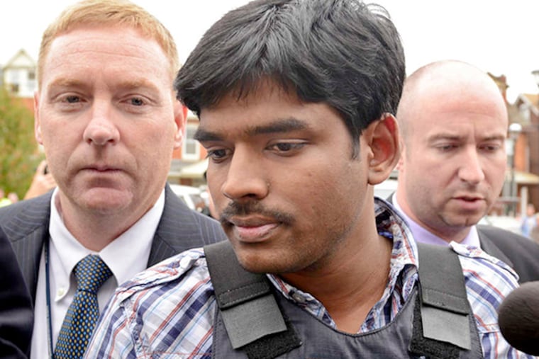 In body armor, Raghunandan Yandamuri is taken into a preliminary hearing. The King of Prussia man, on trial in the 2012 murders of a baby and grandmother, told a Montgomery County jury on Monday that he confessed to the killings because the police had threatened him and his wife.