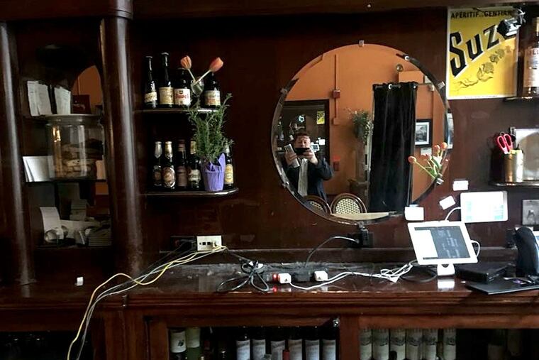 Damage from break-in at Caribou Cafe, as documented by Olivier Desaintmartin.