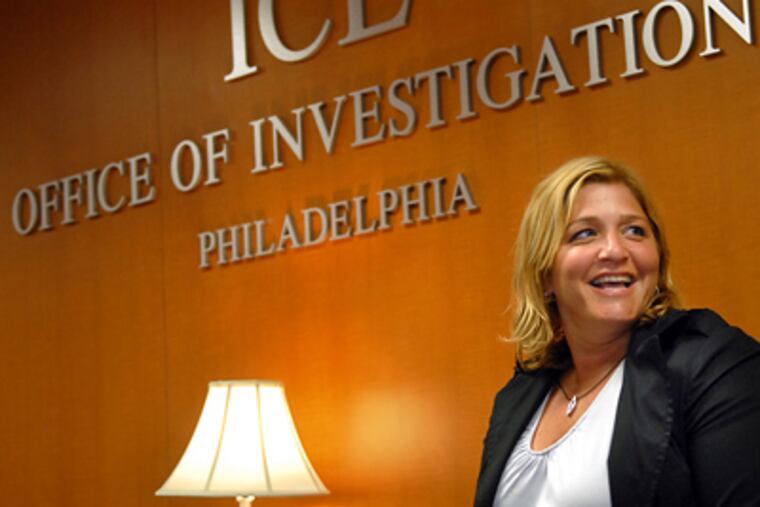 Megan DiPatri at the U.S. Immigration and Customs Enforcement office: Years of work paid off last week. (Tom Gralish / Staff Photographer)