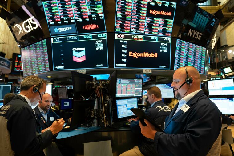 Traders work at the New York Stock Exchange on July 5, 2019 in New York. Boenning & Scattergood, a West Conshohocken securities, asset management and investment banking firm, named a new head of equity research last week.