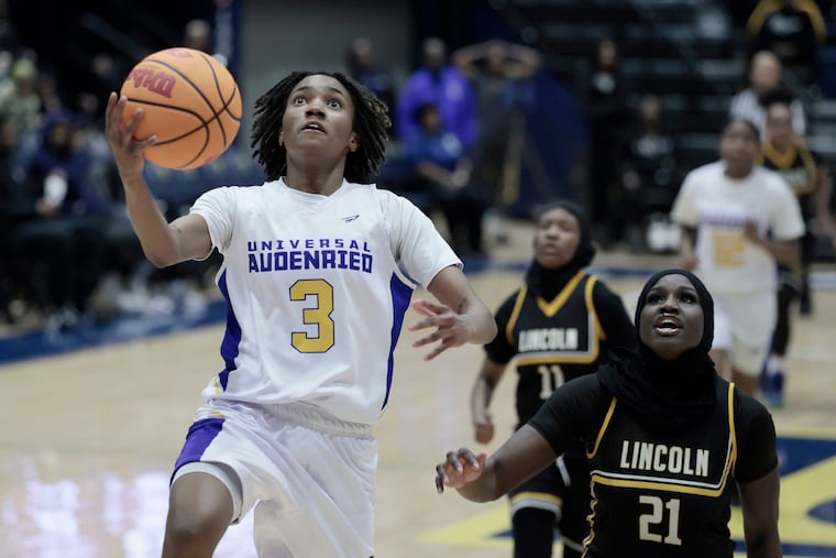 Audenried's Aniyah Cheeseboro (left) attempts a layup during a blowout win over Lincoln on Thursday night.