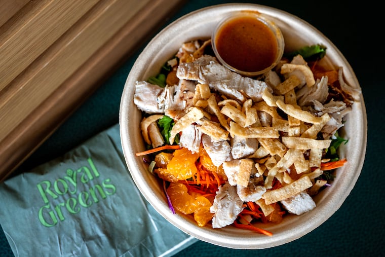 The “Mandarin Crunch Salad” from Royal Greens as served for pickup at Wonder Food Hall in the Garden State Park shopping center on Rt.70 in Cherry Hill Tuesday, May 27, 2025, a few days before its grand opening. The chain’s first South Jersey location has a single kitchen supporting a large variety of menu branding, many affiliated with celebrity chefs, with a focus on pick-up and 30 minute delivery.