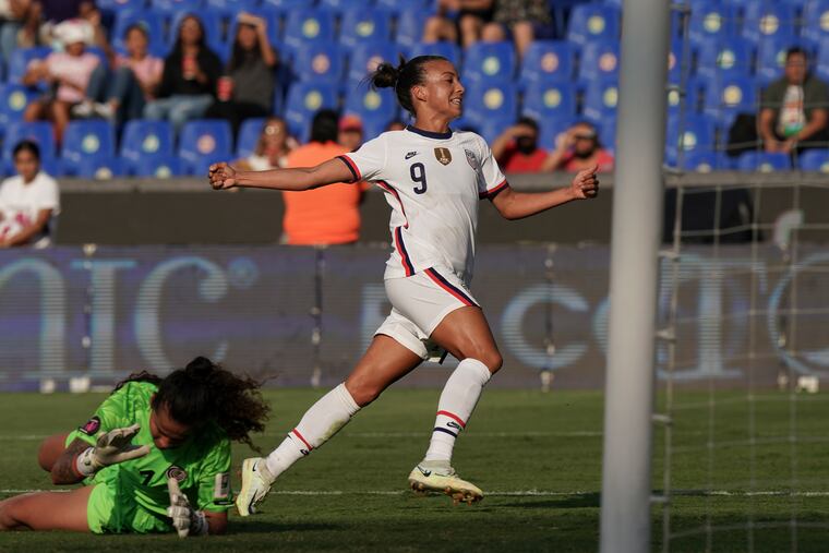Mallory Pugh celebrates after scoring the United States' second goal against Canada.