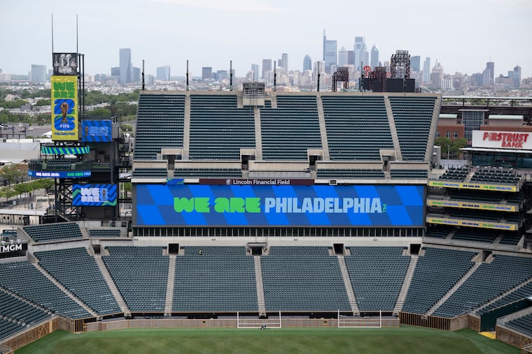 FIFA signage is displayed Wednesday, May 13, 2026, during preparations for the pitch at Lincoln Financial Field, home of the Philadelphia Eagles, ahead of matches to be played during the 2026 FIFA World Cup.