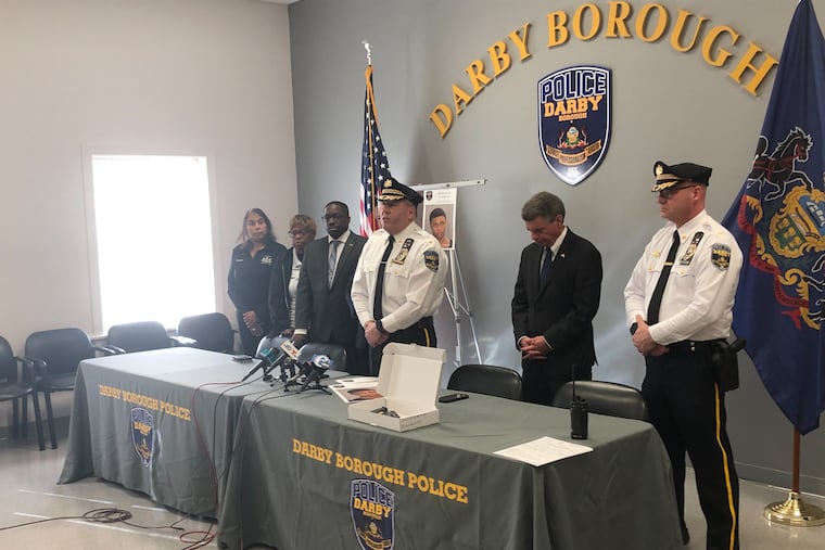 Darby Borough Police Chief Joe Gabe (center) announces the arrest of Samir Austin in a fatal shooting on Wednesday.