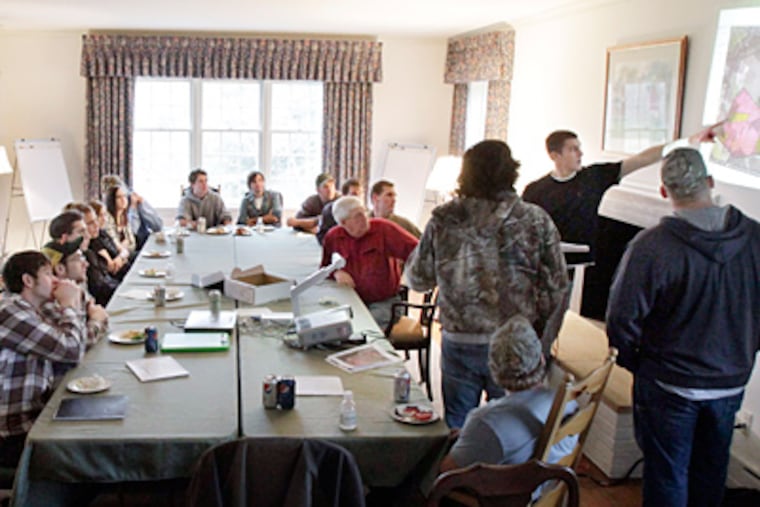 Pointing to a map, DelVal junior Josh Burnside of Quakertown gives a presentation to classmates. The college outside Doylestown had long been a special place for Kenneth Gemmill, whose heirs donated the farm. He had served on its board for 11 years and was chairman for six. (Elizabeth Robertson / Staff Photographer)
