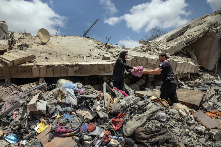 People recover belongings from the rubble of a destroyed home near Nabatieh, Lebanon, on Monday, June 22, 2026. Israel and Hezbollah, the Iran-backed Lebanese militant group, appeared to maintain a tense cease-fire for a second day on Monday. Israel’s military has new orders that restrict troops to defensive actions.