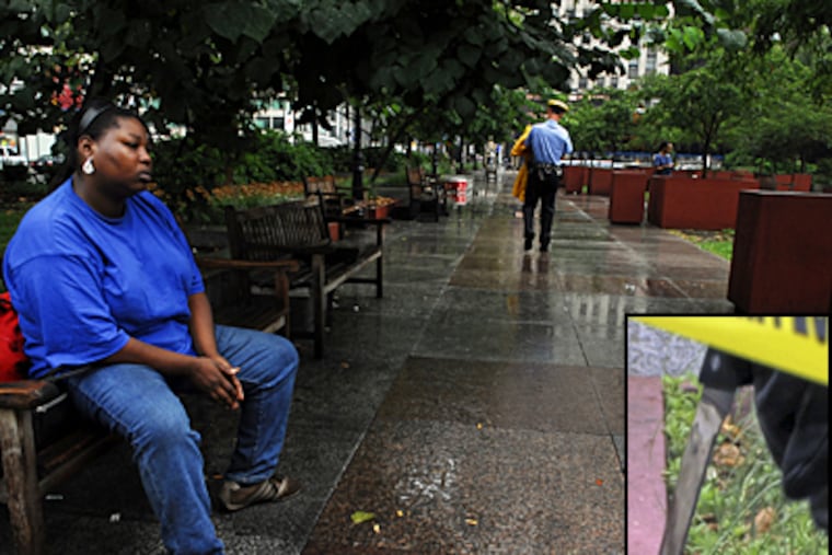 Theopolius Brown, 28, who knew the victim of yesterday's stabbing, sits at Love Park this morning. The kitchen knife apparently used in the attack is pictured at right. (Sarah J. Glover / Inquirer)