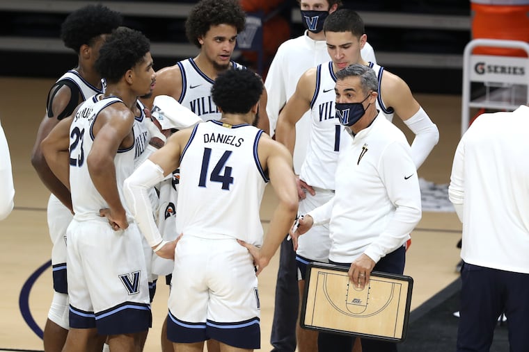 Coach Jay Wright, right, of Villanova, shown huddling with his team during the Creighton game on March 3, has received his first commitment for the freshman class of 2022 in New Jersey combination guard Mark Armstrong.