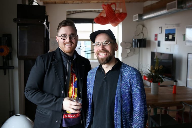 Artist William May (left) and scientist Joel Karpiak have decorated their Old City with trendy furnishings, pop art, and bright color.