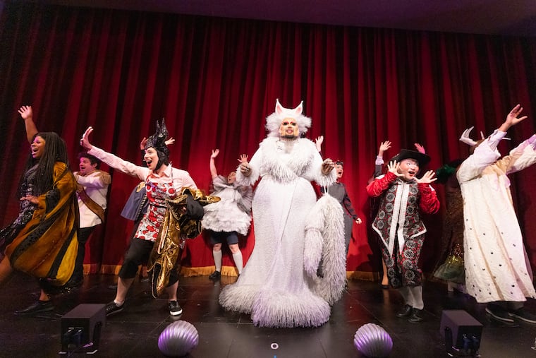 The cast of People's Light Theatre's "Alice in Wonderland: A Musical Panto," with Eric Jaffe as the Guide/Cheshire Cat. The production is the latest in the line of drag-centered youth programming that has received backlash from queerphobic groups.
