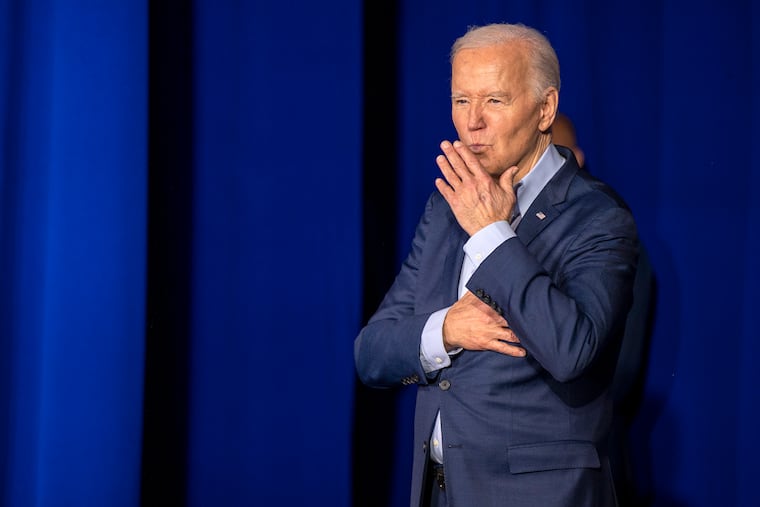 Hand on his heart, President Joe Biden blows a kiss to supporters as he leaves the stage at the Scranton Cultural Center at the Masonic Temple in this April photo. Biden, who withdrew from the presidential race in July, will address the Democratic National Convention in Chicago on Monday.