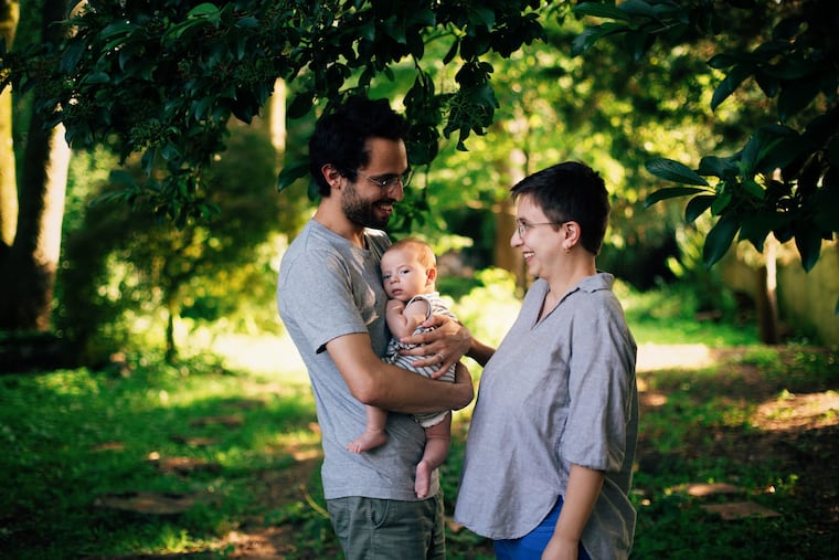 Sam (left) and Sammy with baby Izzy.
