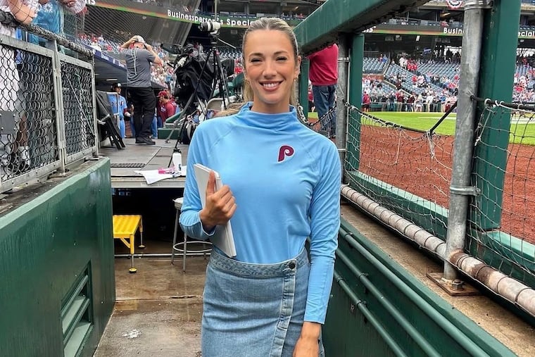 Taryn Hatcher will be giving away several boxes of Phillies gear, like the shirt she's wearing here, at her Gear for Good event on Thursday.