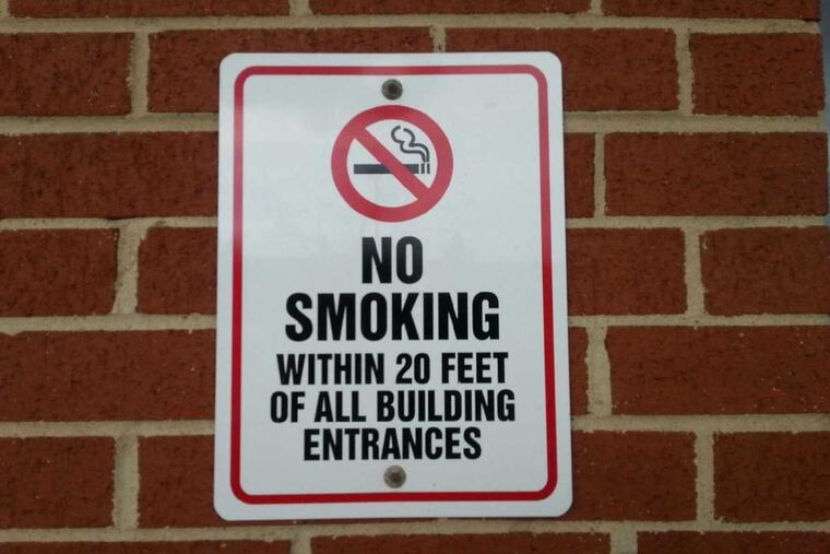 Signs at Philadelphia Housing Authority properties define the smoke-free policy at the agency. PHA is the
largest public housing authority in the nation to ban smoking everywhere, a policy that researchers found halved the levels of airborne nicotine in common areas.