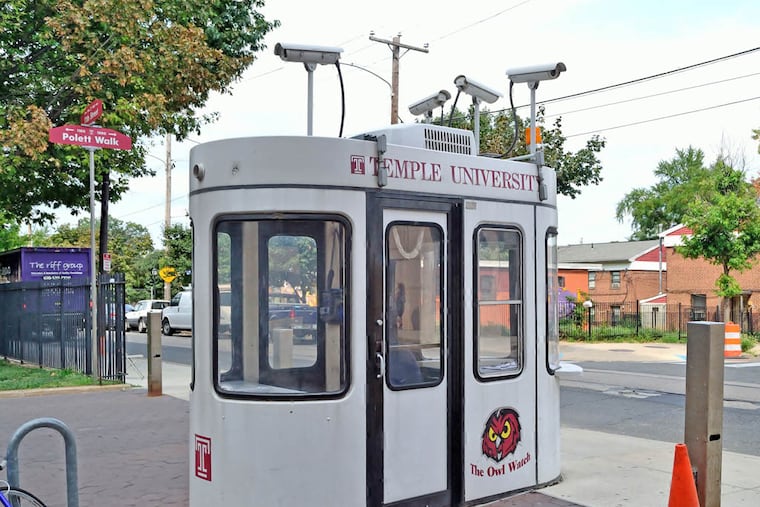 A security kiosk equipped with four video cameras monitors traffic on the edge of Temple University's campus.