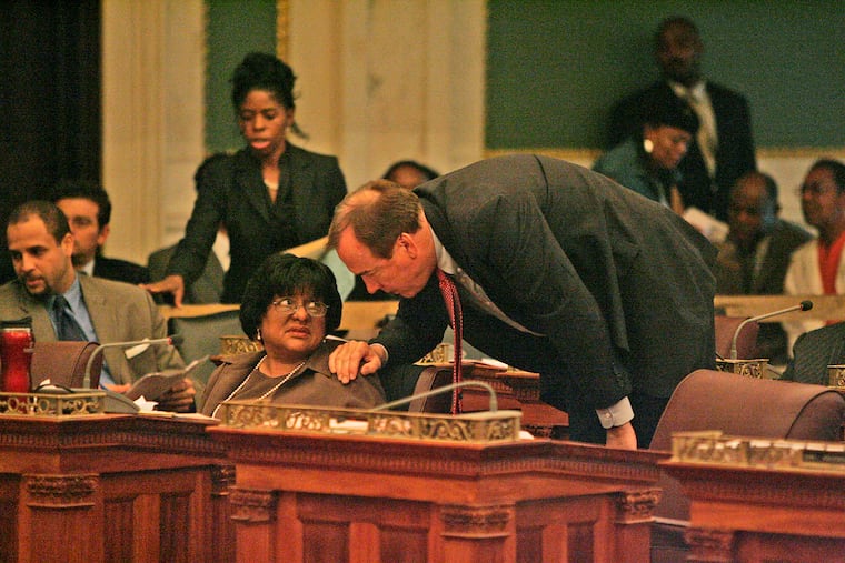 10th District Councilman Brian O'Neill, right, leans over to converse with 3rd District Councilwoman Jannie Blackwell in the first Council session of 2006. The two are the longest tenured members on Council. O'Neill was elected in 1979, Blackwell in 1992.