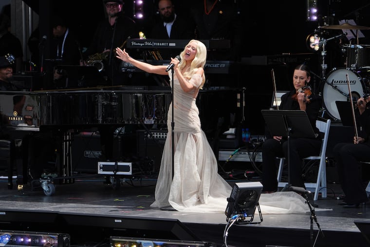 Singer Christina Aguilera performs during the dedication ceremony for the Obama Presidential Center, Thursday, June 18, 2026, in Chicago. She will headline the the July 4 “One Philly: Unity Concert for America” on Ben Franklin Parkway (AP Photo/Jeff Roberson)