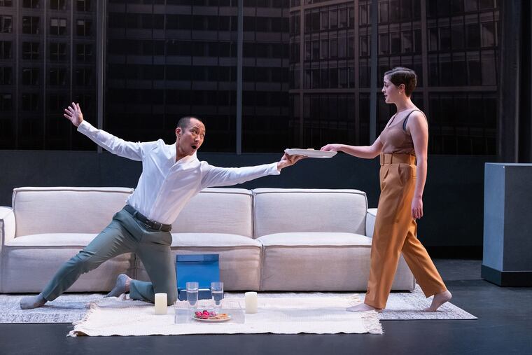 Makoto Hirano (left) and Claire Inie-Richards as Him and Her in "Empathitrax" at Philadelphia Theatre Company.