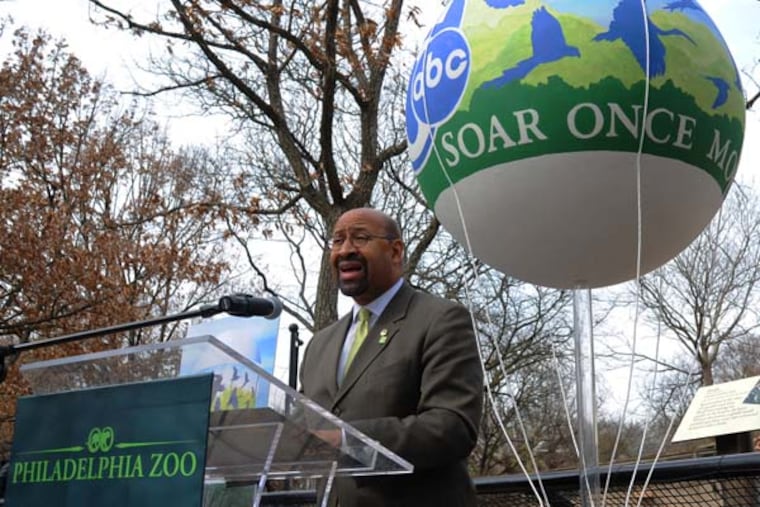 Philadelphia Mayor Michael Nutter announces in a press conference March 21, 2014 that the 6ABC balloon at the Philadelphia Zoo will "Soar Once More." The original balloon was irreparbly damaged during one of this year's winter storms. ( CLEM MURRAY / Staff Photographer )