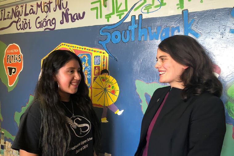 State Representative Elizabeth Fiedler talks with Daisy Rios, a student at Southwark School, on Dec. 11.