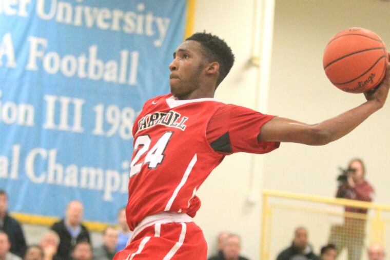 Derrick Jones goes up for a dunk for Archbishop Carroll. (Charles Fox/Staff Photographer)