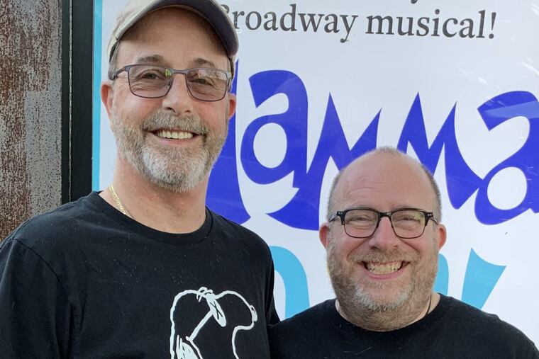 Tim Weaver (left), with Phil Gutis.