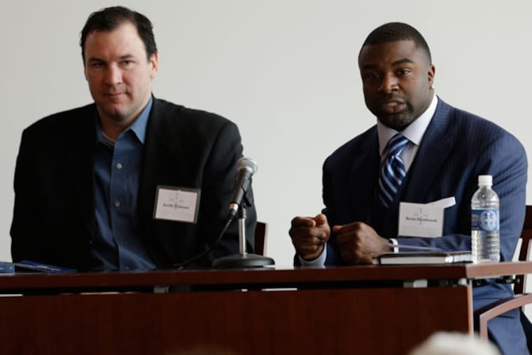 Brian Westbrook (right) speaks during a concussion symposium at Villanova University School of Law, Friday, March 15, 2013, in Villanova, Pa., as former Philadelphia Flyers NHL hockey player Keith Primeau looks on. (Matt Rourke/AP)