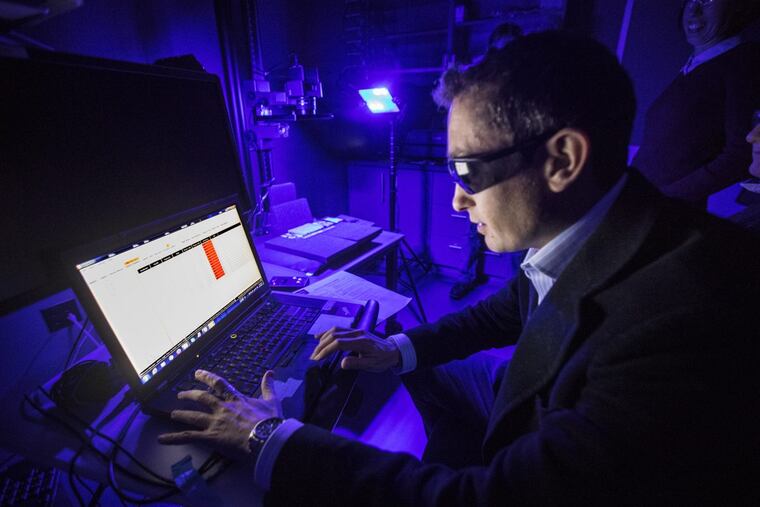 Library of Congress fellow Alberto Campagnolo captures “multispectral” images of a 500-year-old medical text at a University of Pennsylvania library studio.
