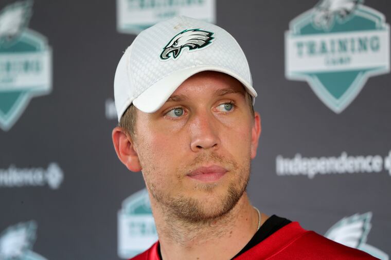 Eagles' Nick Foles talks with reporters after the first session of Philadelphia Eagles training camp at the Novacare Complex on July 26, 2018 in Philadelphia, PA. DAVID MAIALETTI / Staff Photographer