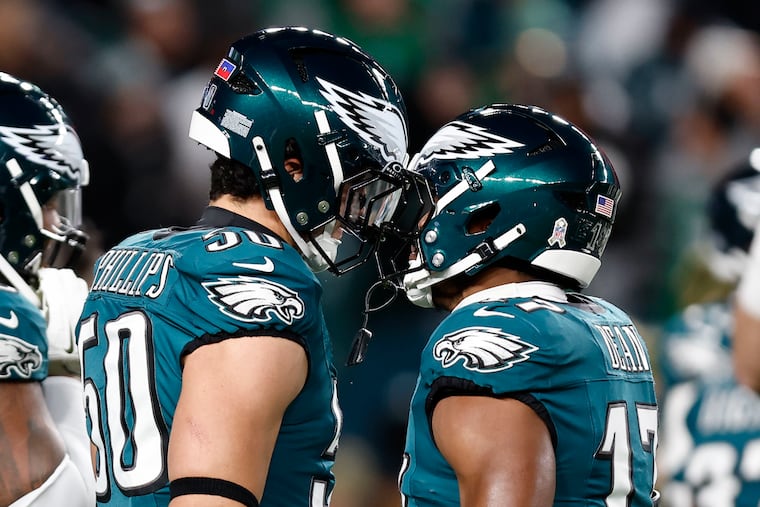 Eagles linebackers Jaelan Phillips (left) and Nakobe Dean might not be back in 2026.