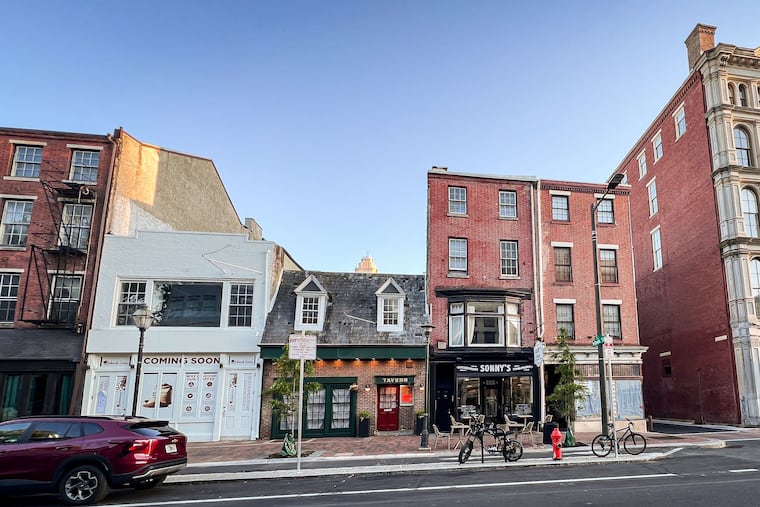 A stretch of the 200 block of Market Street in Old City, seen May 3, 2026. From left: Frame restaurant at 222 Market St., the future Qahwah House at 224 Market St. (white building), the soon-to-open Monto at 226 Market St., Sonny's Famous Steaks at 228 Market St., the future Baba Doner Kebab at 230 Market St., and a future hot pot restaurant at 232 Market St.