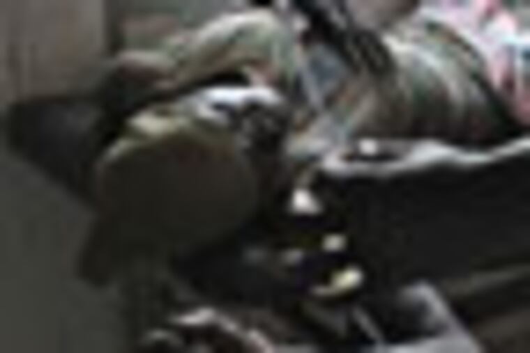 A South Sudanese soldier has a bullet removed from his leg in the Rubkona Military Hospital Sunday, April 22, 2012 in South Sudan. Sudanese armed forces launched an attack more than 6 miles inside South Sudan's border, a South Sudanese official said Sunday, days after the South announced it is pulling its troops from a disputed border town to avoid an all out war between the two countries, Deputy Director of Military Intelligence for South Sudan Maj. Gen. Mac Paul said ground troops from Sudan launched three waves of attacks. (AP Photo/Michael Onyiego