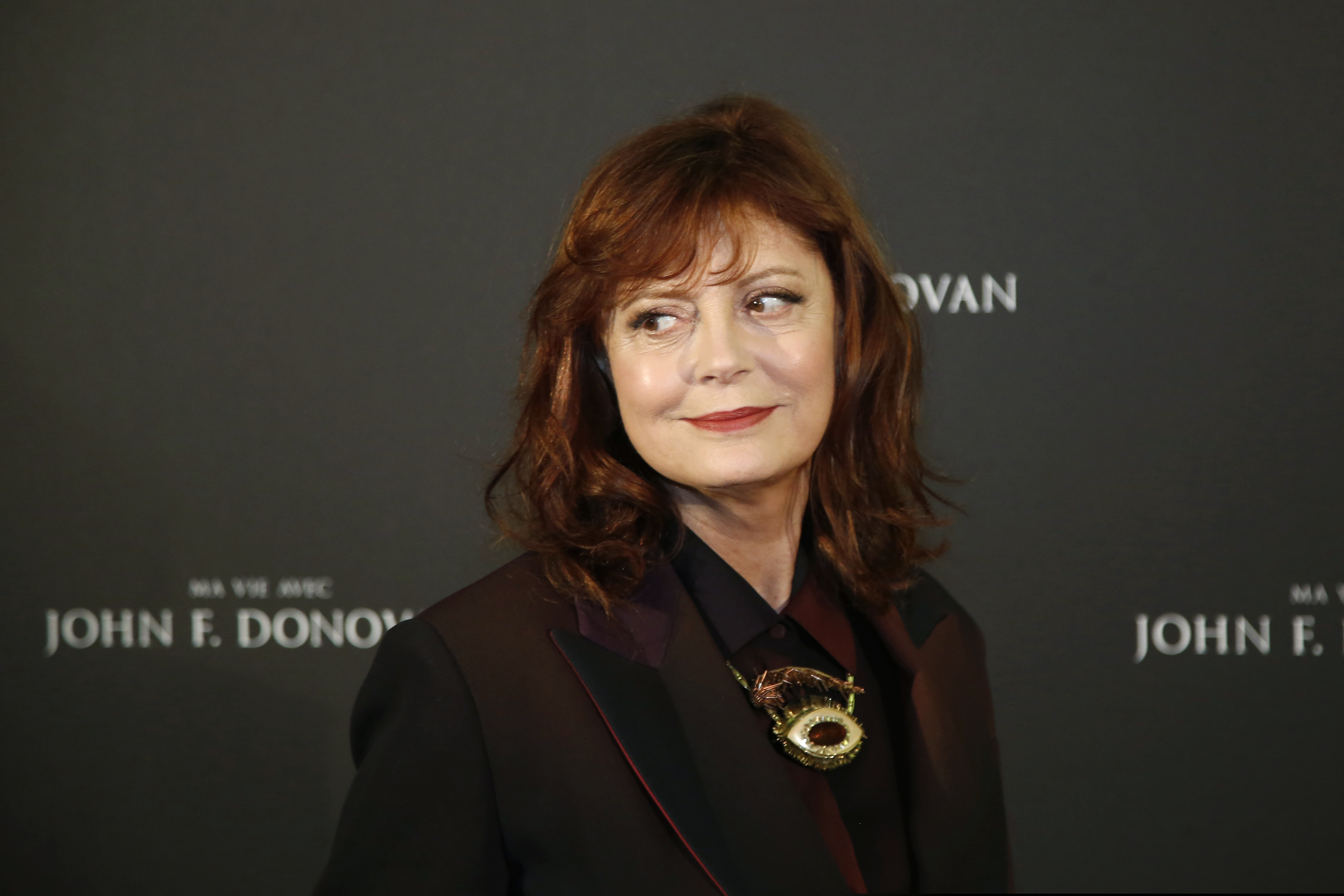 FILE - In this Feb. 28, 2019, file photo, actress Susan Sarandon poses for photographers at the photo call for the film 'The Death and Life of John F. Donovan' in Paris. From Ben Affleck and Susan Sarandon to Anna Wintour and Willie Nelson, celebrities lined up to give money to their favorite Democratic presidential candidates. (AP Photo/Michel Euler, File)