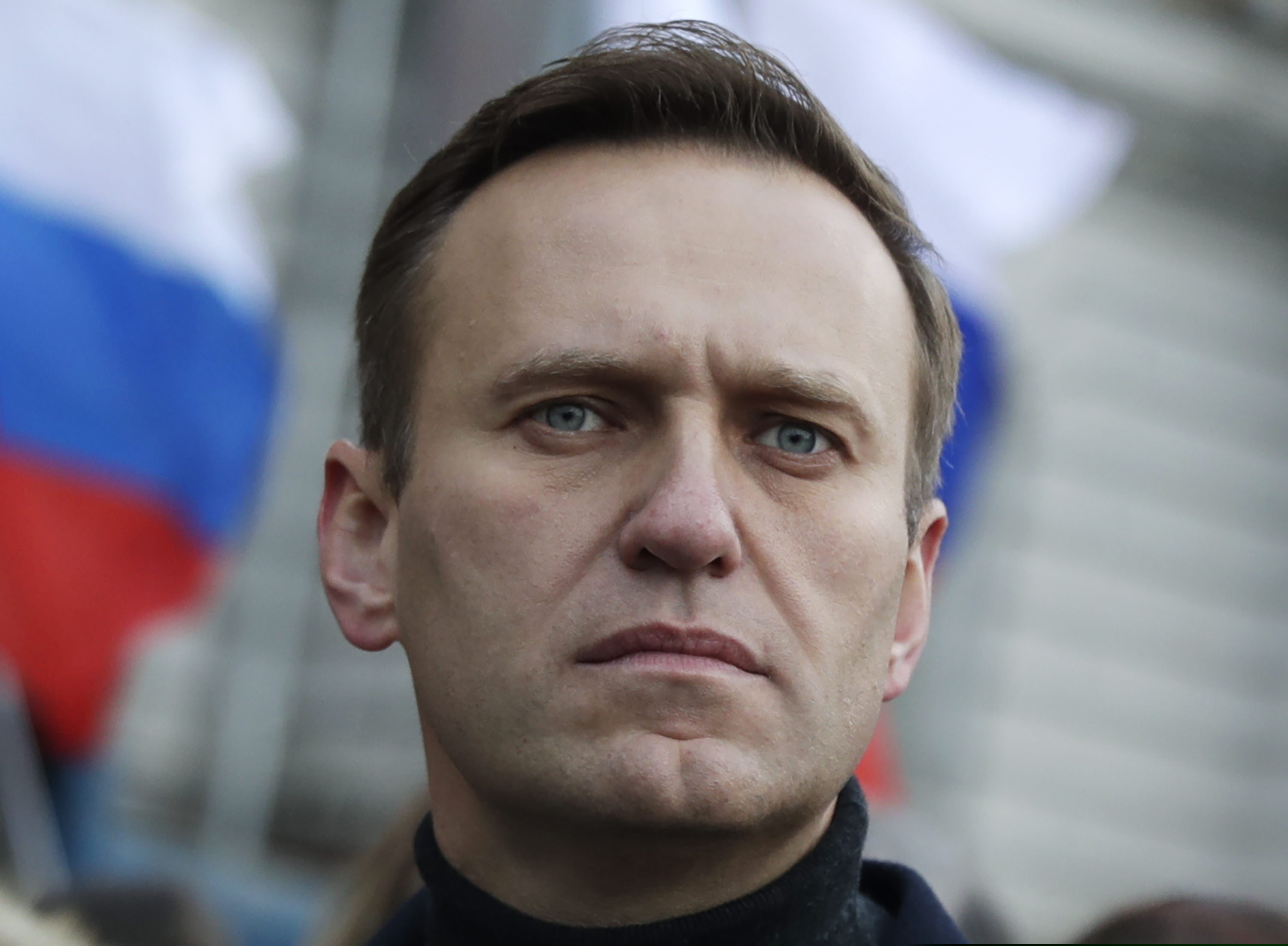 In this file photo taken on Saturday, Feb. 29, 2020, Russian opposition activist Alexei Navalny takes part in a march in memory of opposition leader Boris Nemtsov in Moscow. The German hospital treating Navalny says tests indicate that he was poisoned.