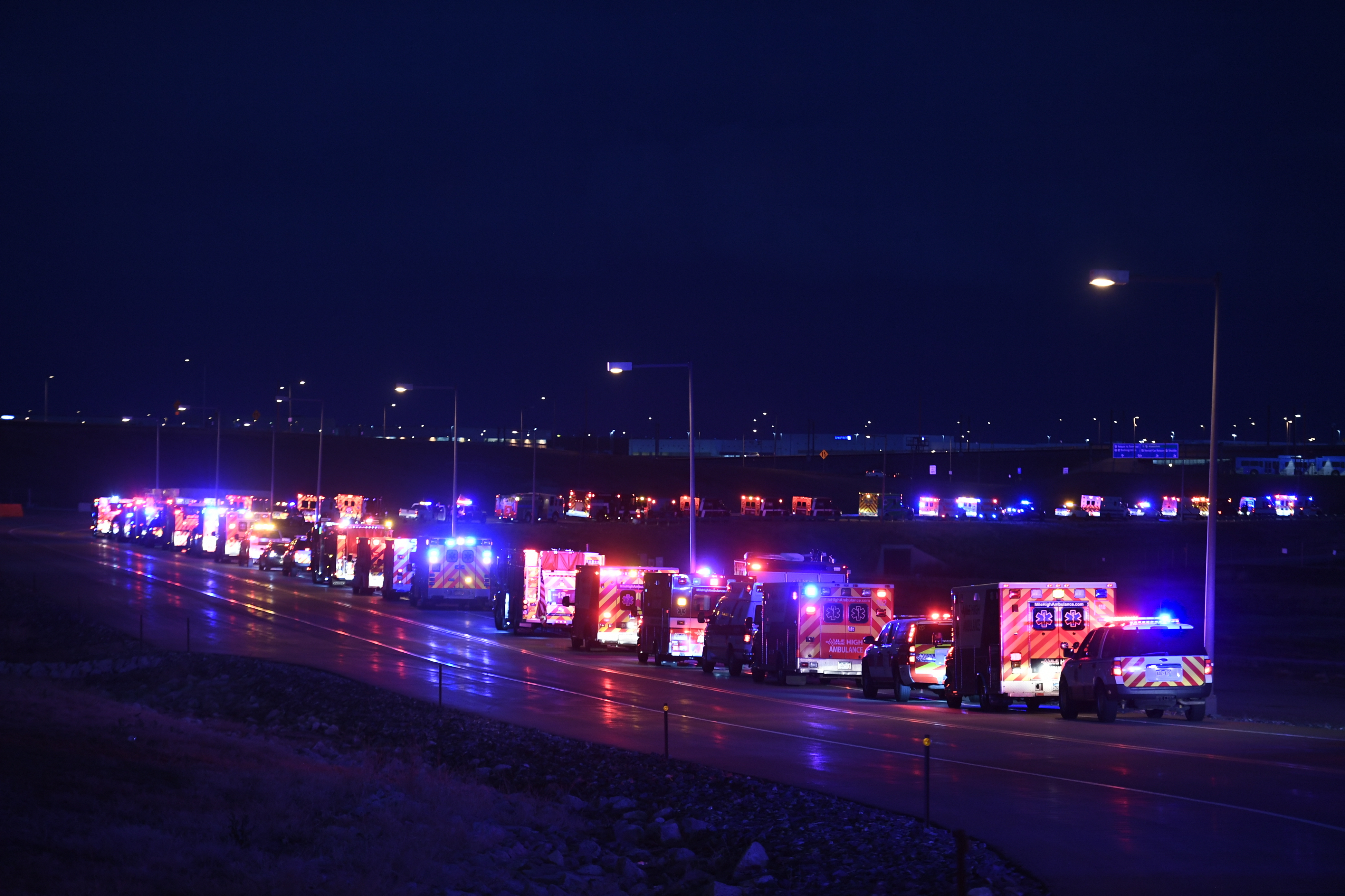 The procession of emergency vehicles for paramedic Paul Cary made its way out of Denver International Airport on Sunday. Cary died from coronavirus after volunteering to help combat the pandemic in New York City.