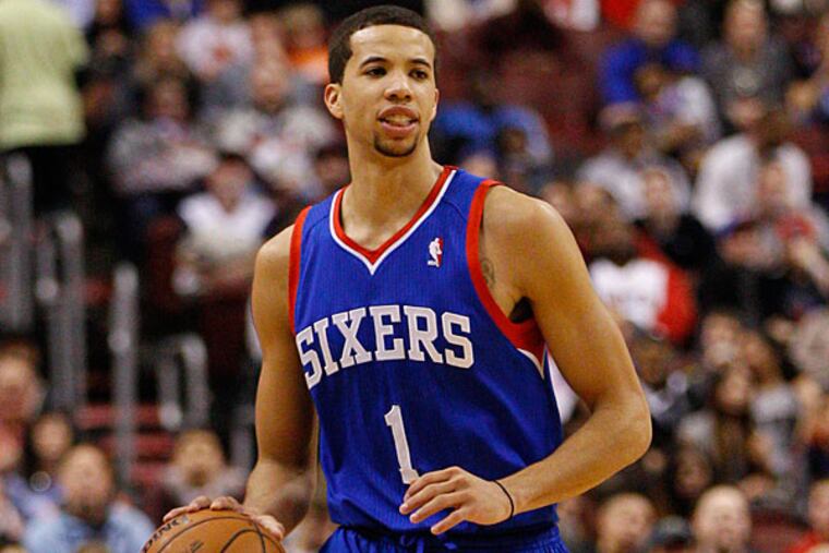 Michael Carter-Williams in action during the second half of an NBA basketball game against the Oklahoma City Thunder, Saturday, Jan. 25, 2014, in Philadelphia. The Thunder won 103-91. (Chris Szagola/AP)