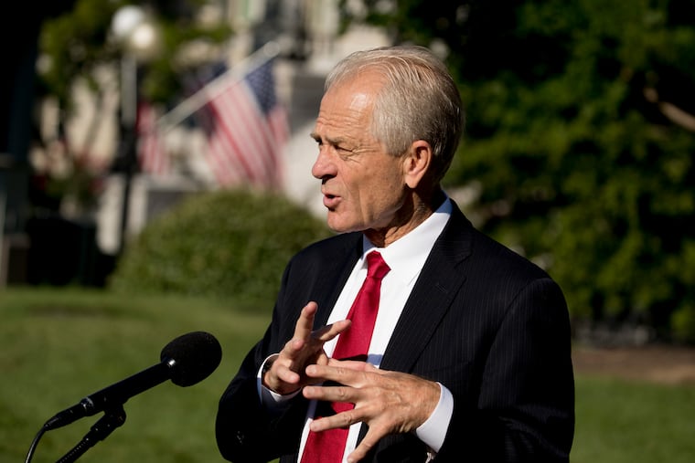 White House trade adviser Peter Navarro speaks with reporters outside the West Wing at the White House in Washington, Monday, July 27, 2020.