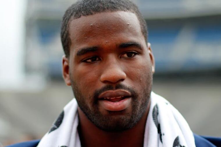 Penn State defensive end Deion Barnes waits for a group photo during the NCAA college football team's media day in State College, Pa., Thursday, Aug. 8, 2013. (Gene J. Puskar/AP)